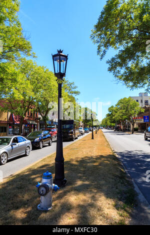 Wellsboro, PA, USA - July 26, 2016: The downtown streets of Wellsboro still illuminated with authentic gas street lamps. Stock Photo