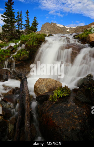 Waterfall from Lake Isabelle in the Colorado Indian Peaks Wilderness Rocky Mountain summer Stock Photo