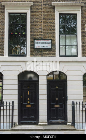 tow front doors in the affluent london address area of trinity church square. period georgian and victorian town houses in the centre of london. Stock Photo
