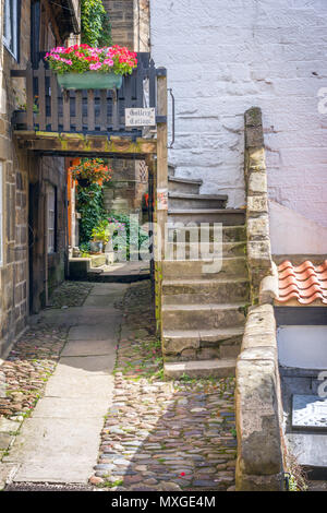 One of the many quaint cottages in Robin Hoods Bay, on the North Yorkshire Wolds. Stock Photo