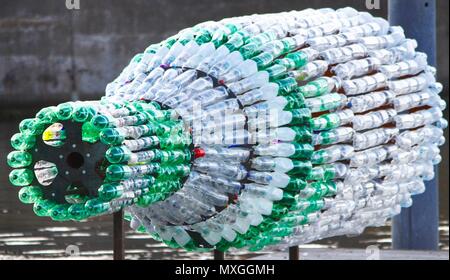 New Brighton, Merseyside. 3rd Jun, 2018. A GIANT sculpture addressing the issue of plastic pollution has been unveiled in New Brighton,Merseydide Artist Lulu Quinn's 'Message in a Bottle' is a 26ft (8m) bottle made entirely from recycled plastic, which at night becomes a beacon, illuminated from within.credit Ian Fairbrother/Alamy Live news Stock Photo