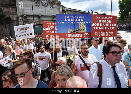 London, Britain. 3rd June, 2018. People take part in a commemoration to mark the one year anniversary of the deadly London Bridge terrorist attack in London, Britain, on June 3, 2018. Britain's capital fell silent Sunday as London remembered the eight people killed exactly a year ago in a terror attack on London Bridge and the nearby Borough Market. A one-minute silence was held on the bridge as well as across London following a service to honor the victims at Southwark Cathedral. Credit: Stephen Chung/Xinhua/Alamy Live News Stock Photo