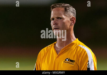 June 3, 2018 - Fort Bragg, North Carolina, US - June 3, 2018 - Fort Bragg, N.C., USA - All-Army Soccer assistant coach Col. Bernie Koelsch watches the action during a first round match between the U.S. Army and U.S. Air Force at the 2018 Armed Forces MenÃ•s Soccer Championship, at Hedrick Stadium, on Fort Bragg. Air Force, the defending Armed Forces champions, defeated Army 2-1 in overtime. The Armed Forces MenÃ•s Soccer Championship is conducted every two years. (Credit Image: © Timothy L. Hale via ZUMA Wire) Stock Photo