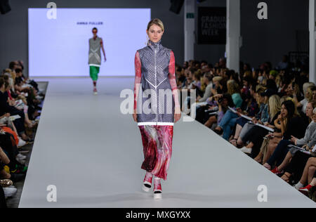 Anna Fuller's Collection seen during Bath Spa's Fashion Show at Graduate Fashion Week in London 2018. Nearly all incorporate dayglow elements. Credit: Marc Wainwright Photography/Alamy Live News Stock Photo