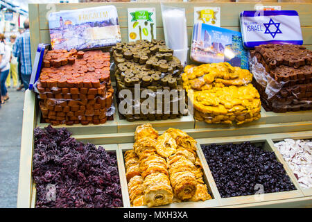 9 May 2018 A large range of confectionary on display at a vendor's stall at the Mahane Yehuda covered street market in Jerusalem Israel Stock Photo