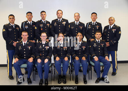 Twelve contestants vied for the Best of the Best honor Nov. 1-5, 2016, in the California Army National Guard’s 2017 Best Warrior Competition at Camp San Luis Obispo, San Luis Obispo, California.Sitting: Spc. Patrick Mayo, 118th Maintenance Company, 224th Sustainment Brigade; Spc. Aurora Pass; 49th Personnel Support Company, 115th Regional Support Group; Sgt. Natalie Aquino, 870th Military Police Company, 49th Military Police Brigade; Spc. Jazmin Garcia-Aguilar, 870th Military Police Company, 49th Military Police Brigade; and Spc. Fabio Avetisyan, Headquarters-Headquarters Detachment, 1106th Th Stock Photo