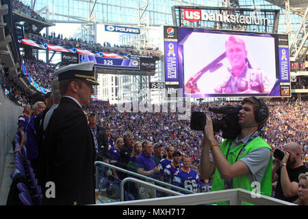 Seattle Seahawks vs. Minnesota Vikings. Fans support on NFL Game.  Silhouette of supporters, big screen with two rivals in background Stock  Photo - Alamy