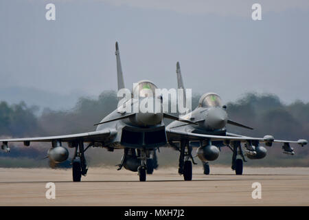 Two Royal Air Force Eurofighter Typhoon FGR4s taxi off of the runway after landing at Osan Air Base, Republic of Korea, Nov. 5, 2016. The arrival of the Typhoons marks the first time the RAF has fielded aircraft on the Korean Peninsula since 1956. (U.S. Air Force photo by Senior Airman Victor J. Caputo) Stock Photo