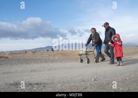 Residents of Dalanzadgad, Mongolia, evacuate to collection centers May 4, 2017, in response to a simulated earthquake during Gobi Wolf 2017. GW 17 is hosted by the Mongolian National Emergency Management Agency and Mongolian Armed Forces as part of the United States Army Pacific's humanitarian assistance and disaster relief 'Pacific Resilience' series. Stock Photo