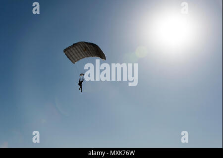 ELOY, AZ. (May 5, 2017) An Explosive Ordnance Disposal technician descends during joint Explosive Ordnance Disposal Group (EODGRU) 1 and 2 military free-fall training in Eloy, Az. EODGRU 1 and 2 provide operational EOD capability as required for the location, identification, rendering safe, recovery, field evaluation and disposal of all explosive ordnance including chemical and nuclear weapons. Stock Photo