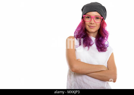 Studio shot of young beautiful woman wearing pink eyeglasses wit Stock Photo