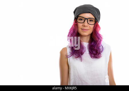 Studio shot of young beautiful woman wearing eyeglasses Stock Photo