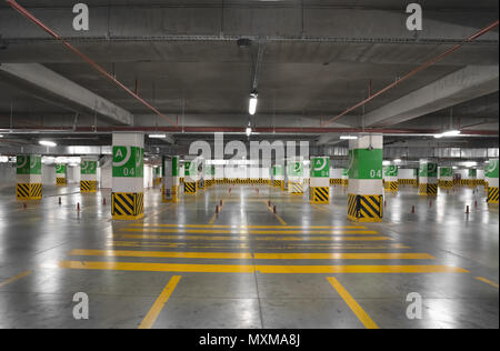 Underground parking Garage with many free places. Stock Photo