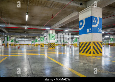 Underground parking Garage with many free places. Stock Photo
