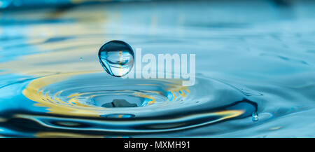 colorful water drop splash Stock Photo