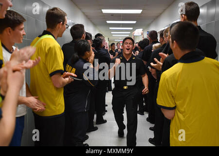 161117-N-DY073-294 ANNAPOLIS, Md. (Nov. 17, 2016) U.S. Naval Academy first-class midshipmen celebrate as they receive their service assignments during a ceremony in Bancroft Hall. At this annual event, midshipmen learn which warfare community they will join after graduation, in May. (U.S. Navy photo by Petty Officer 3rd Class Brianna Jones/Released) Stock Photo