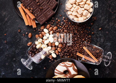 Tasty and sweet candies on wooden background Stock Photo