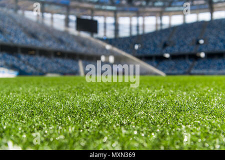 A fragment of a football field. Trimmed grass on the lawn Stock Photo