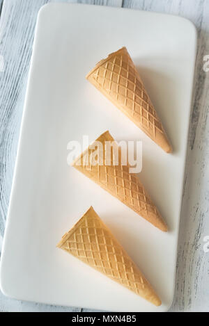Waffle cones on the white plate Stock Photo