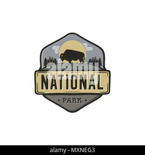 National park vintage badge. Mountain explorer label. Outdoor adventure logo design with bison. Travel and hipster insignia. Wilderness, forest camping emblem. Hiking, backpack. Stock  Stock Photo