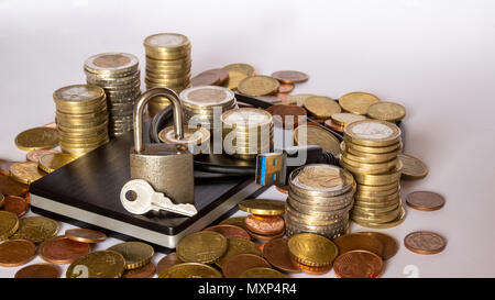 External hard drive and a pile of money Stock Photo