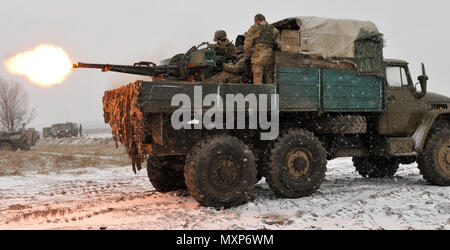 Ukrainian Soldiers assigned to 1st Battalion, 80th Airmobile Brigade fire a ZU-23-2 towed antiaircraft weapon before conducting an air assault mission in conjunction with a situational training exercise led by Soldiers from 6th Squadron, 8th Cavalry Regiment, 2nd Infantry Brigade Combat Team, 3rd Infantry Division, Nov. 28, 2016 at the International Peacekeeping and Security Center. This training is part of their 55-day rotation with the Joint Multinational Training Group-Ukraine. JMTG-U is focused on helping to develop an enduring and sustainable training capacity within Ukraine.  (U.S. Army  Stock Photo