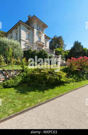 beautiful classical mansion surrounded by a park Stock Photo