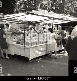 1950s, historical, outdoor market stall selling ladies cloth and linen  undergarments, including girdles and corsets, Paris Stock Photo - Alamy