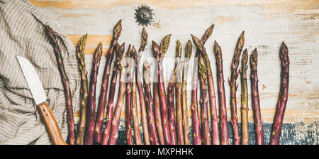 Raw uncooked purple asparagus Stock Photo