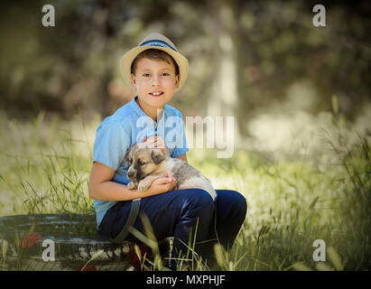 cute boy with a dog Stock Photo