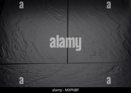 Dark gray slate tile background. Stock Photo
