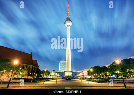 BERLIN, GERMANY, AUGUST 18, 2015: night view of fernsehturm with neptun fountain in berlin. Stock Photo