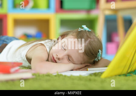 Tired schoolgirl sleeping Stock Photo