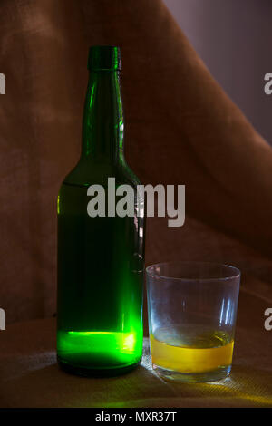 Bottle and glass of cider. Asturias, Spain. Stock Photo