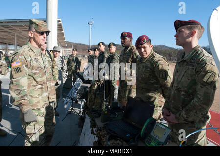 U.S. Army Spc. Bryan McGuigan, a Tactical Satellite Operator assigned to 112th Signal Detachment, Special Operations Command Korea, briefs  U.S. Eighth Army Commanding General, Lt. Gen. Thomas S. Vandal about the SDN SOF Deployable Node during a static display at a Republic of Korea Special Warfare Command Installation near Icheon, Republic of Korea December 1, 2016, as a part of the 2016 C4I (Command Control Communication Computers Intelligence) Summit. The C4I Summit showcases joint interoperability between U.S. and ROK forces. (U.S. Army photo by Staff Sgt. Ricardo HernandezArocho/ Released Stock Photo