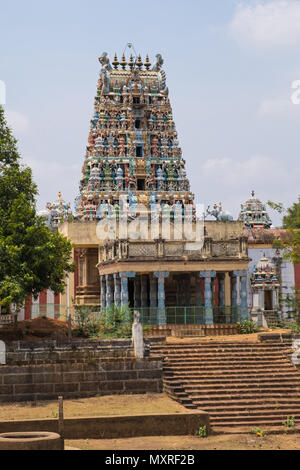 The ornately carved entrance gateway, or Gopuram, at the 8th century Sri Desikanathar Hindu temple in Soorakudi in Tamil Nadu state, India Stock Photo