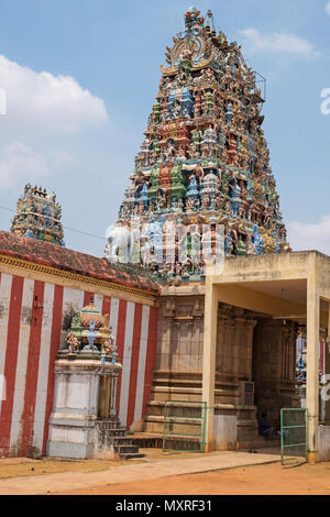 The ornately carved entrance gateway, or Gopuram, at the 8th century Sri Desikanathar Hindu temple in Soorakudi in Tamil Nadu state, India Stock Photo