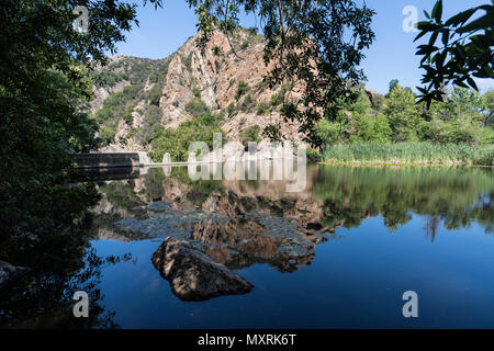 Malibu Creek State Park Century Lake and dam at in the Santa Monica Mountains near Los Angeles, California. Stock Photo