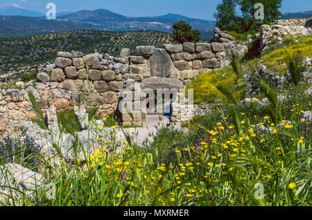 Mikines Greece -View of the Lion Gate - the main entrance of the Bronze Age citadel of Mycenae Stock Photo