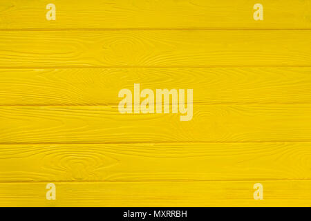Brushed wood texture with yellow color background Stock Photo