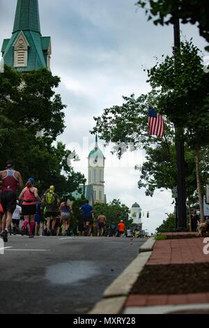 Participants of the 11th Annual Marine Corps Historic Half (MCHH) run the 13.1-mile route from the Fredericksburg Expo Center into the historic downtown areas of Fredericksburg, Va. May 20, 2018, May 20, 2018. The MCHH attracts over 8, 000 participants and includes the Devil Dog Double and Marine Corps Semper 5ive races. (U.S. Marine Corps photo by Lance Cpl. Paige M. Verry). ()