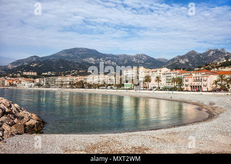 France, French Riviera, Menton town beach and skyline, resort on Mediterranean Sea Stock Photo