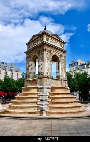 Paris, France. Hot bright sunny spring day, May 2018. Fontaine des Innocents in Les Halles.