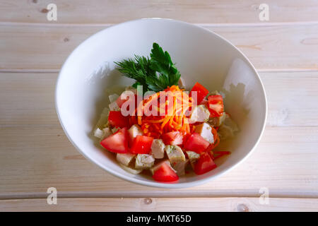 Salad with spicy carrot, tomato and chicken Stock Photo
