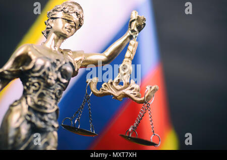 Law and Justice, Legality concept, Scales of Justice, Justitia, Lady Justice in front of the Russian flag in the background. Stock Photo