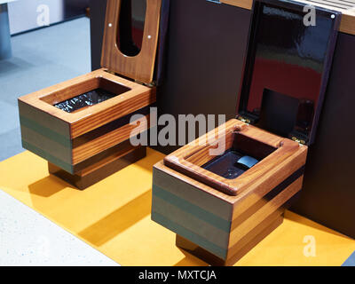 Wooden toilet bowls in the store Stock Photo
