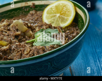 Pakistani cuisine ,Mutton Taka Tak Lahori Style,  mutton brain, sweet bread and kidney in assorted spices, served with mint chutneyTraditional assorte Stock Photo