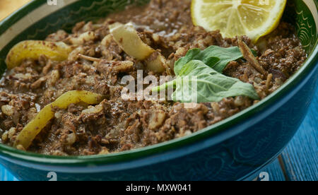 Pakistani cuisine ,Mutton Taka Tak Lahori Style,  mutton brain, sweet bread and kidney in assorted spices, served with mint chutneyTraditional assorte Stock Photo