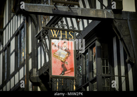 landmark main shopping road Eastgate Street Chester, Cheshire, England, Tudor shops in the historic city centre WH Smiths sign Stock Photo