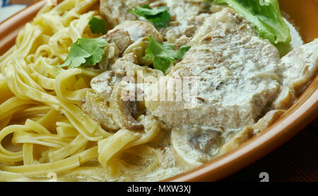 Tender Pork Marsala, made with marinated pork tenderloin smothered in a mushroom wine sauce Stock Photo